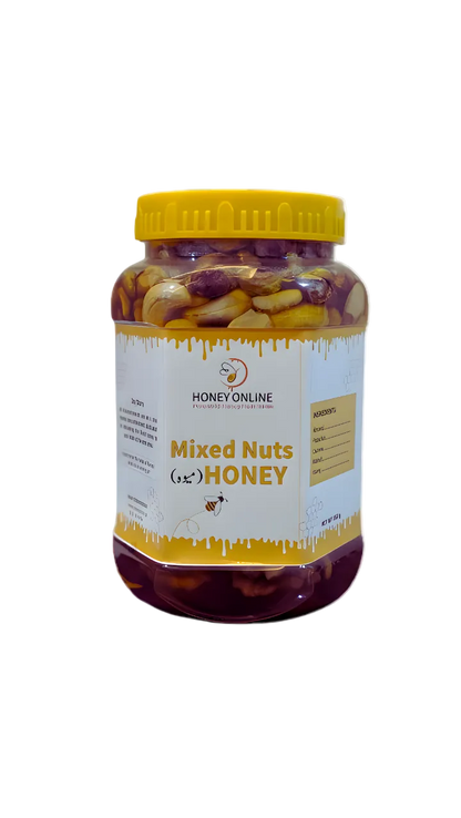 Jar of mixed nuts with honey on a white background